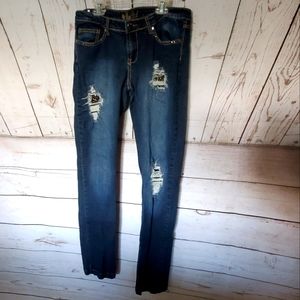 Red Rivet low rise dark wash five pocket distressed jeans with studs 13